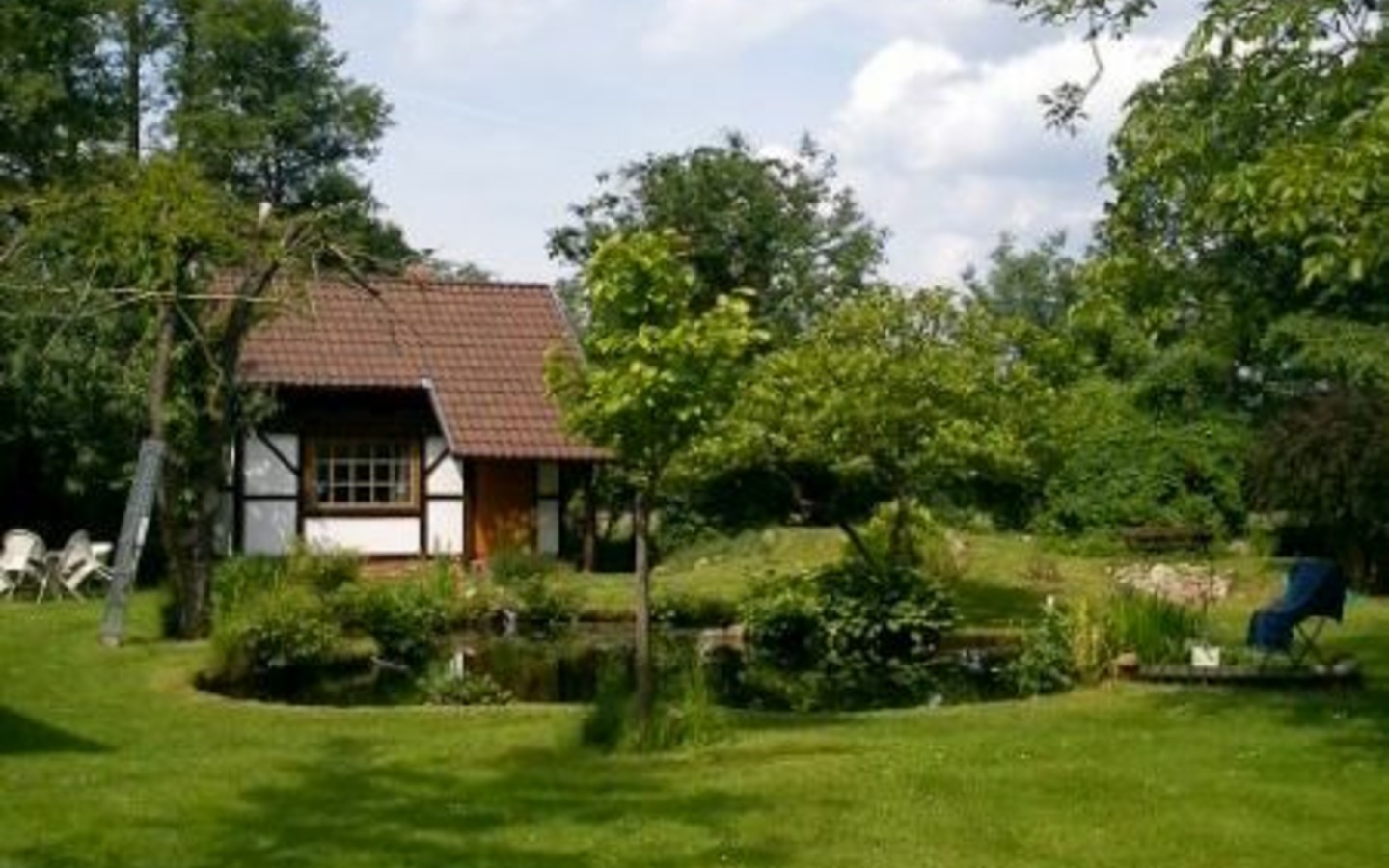 Haus mit Teich